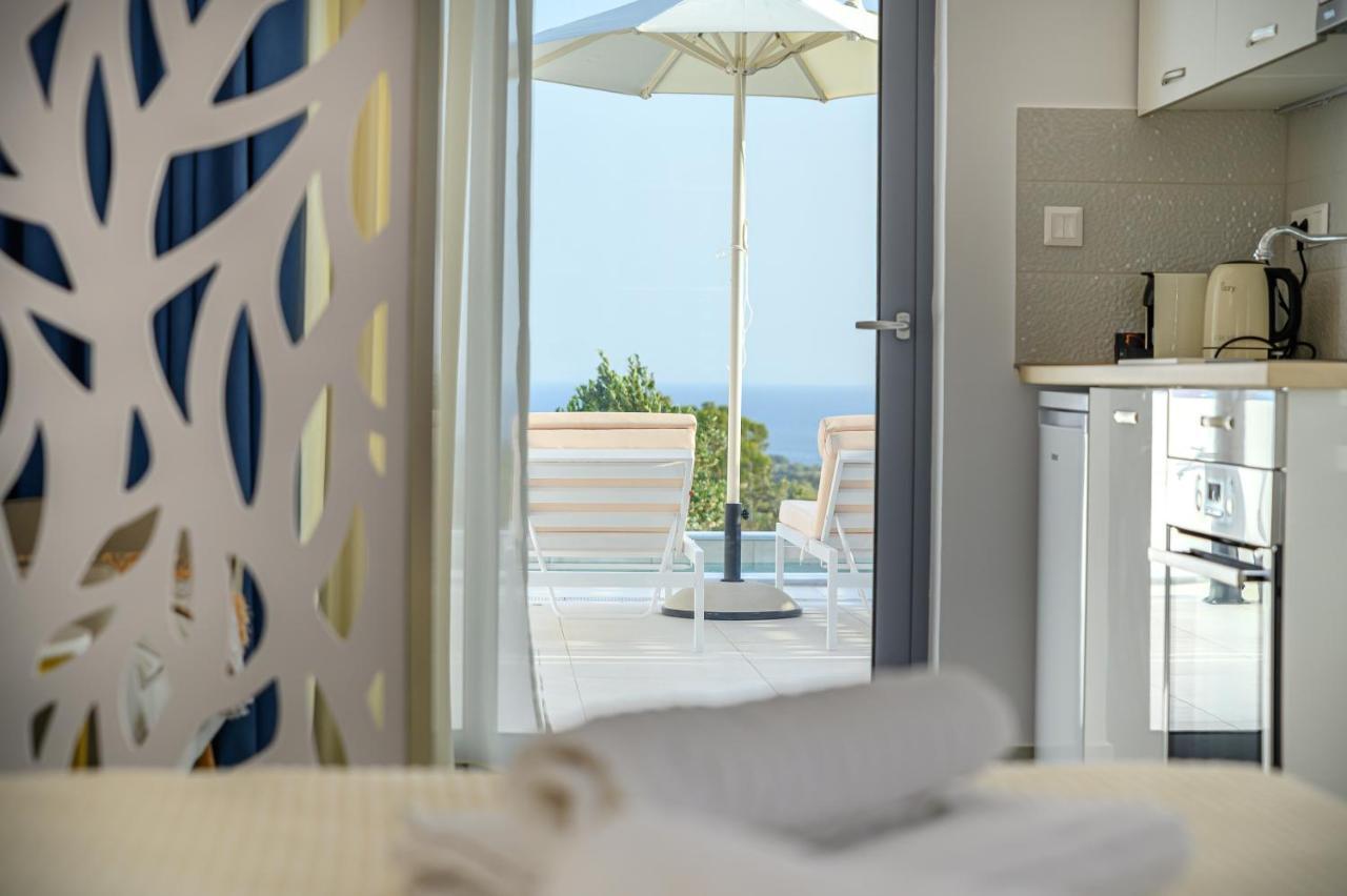 Dionisos Suites Lixúri Exterior foto